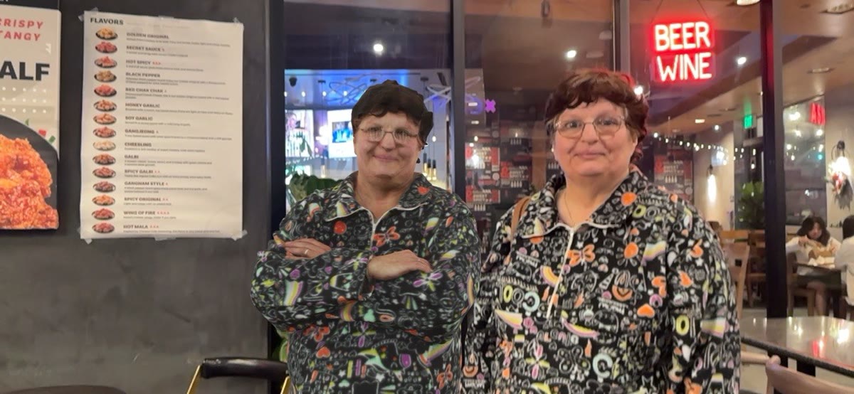 Two DIGISHOT subjects in matching colorful outfits